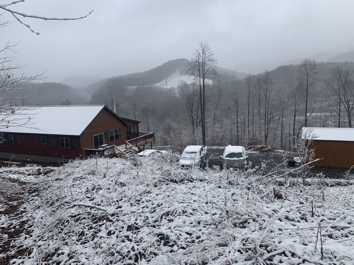 beautiful new prefab log cabin in the snowy moutains of parson west virginia