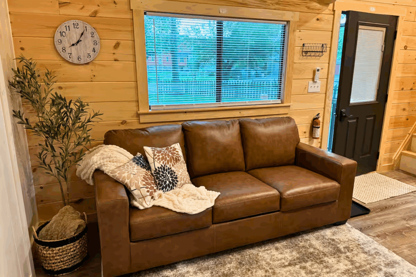 Livingroom of Pinecrest Park Model Tiny home at Red Run Resort Site 66 in New Holland Pa