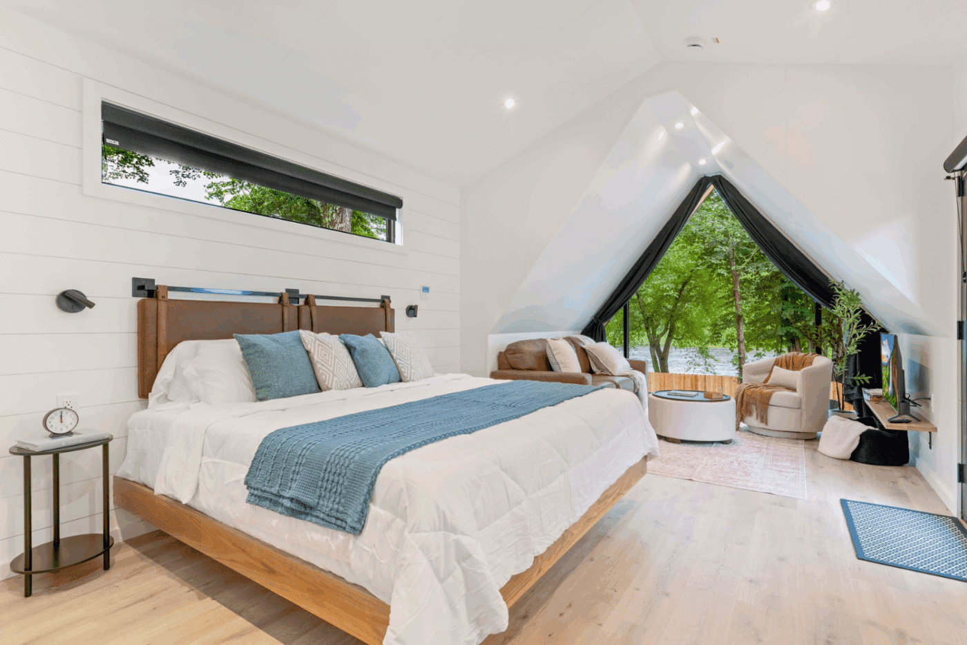 common area of A frame studio park model Rushing water 2 in Pond Eddy New York at The Outpost Resort