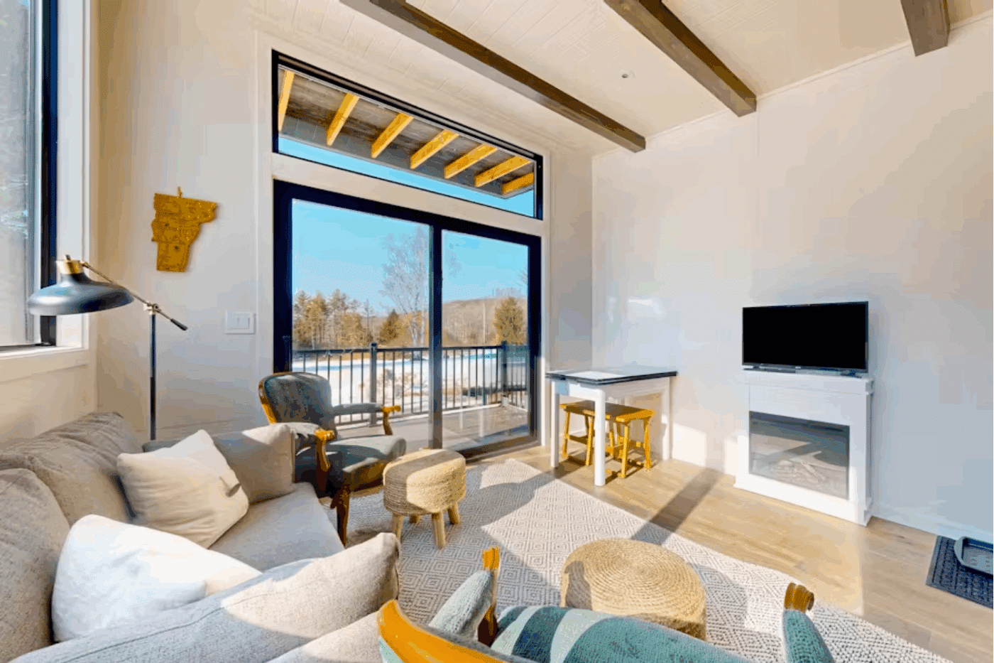 Rockwood tiny home living room built by Zook cabins and located in Weston VT