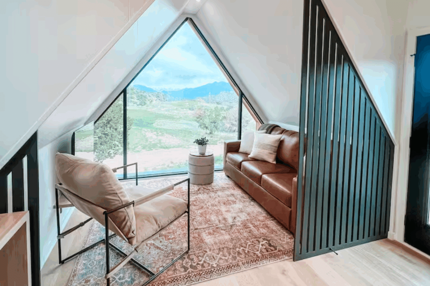 living room of A frame park model tiny home in Cañon City Colorado at Royal Gorge RV Resort Peakview 2