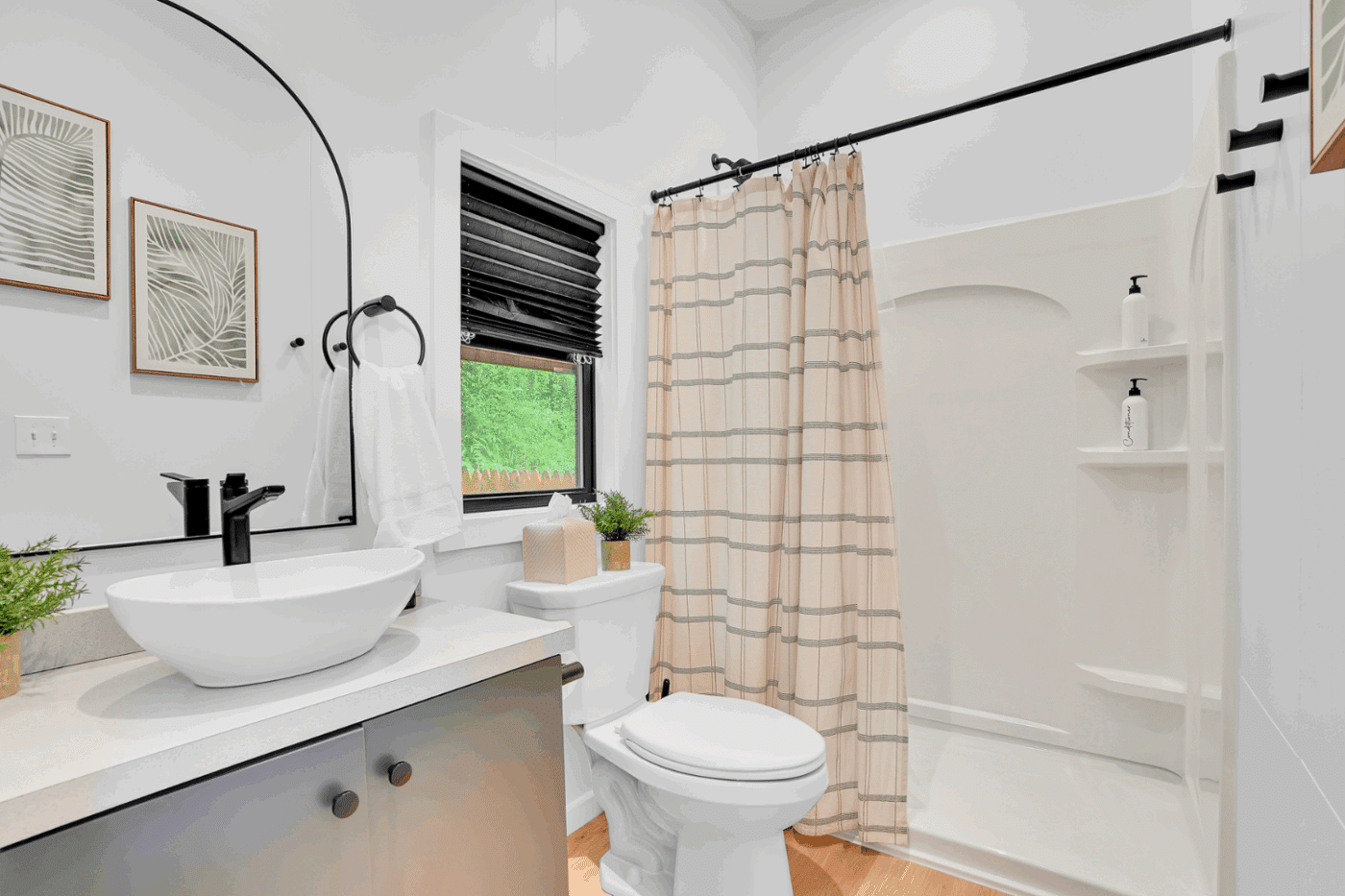 Full sized bathroom in cascade park model tiny home built and designed by Zook cabins site 15