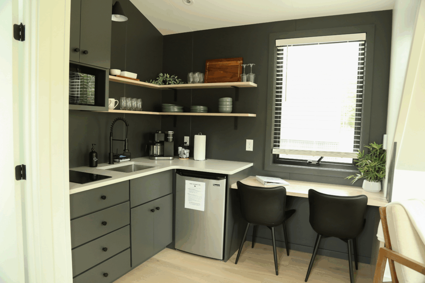 kitchen and dining area of A Frame 33 park model tiny home in Milroy Pa At The HArtman Center