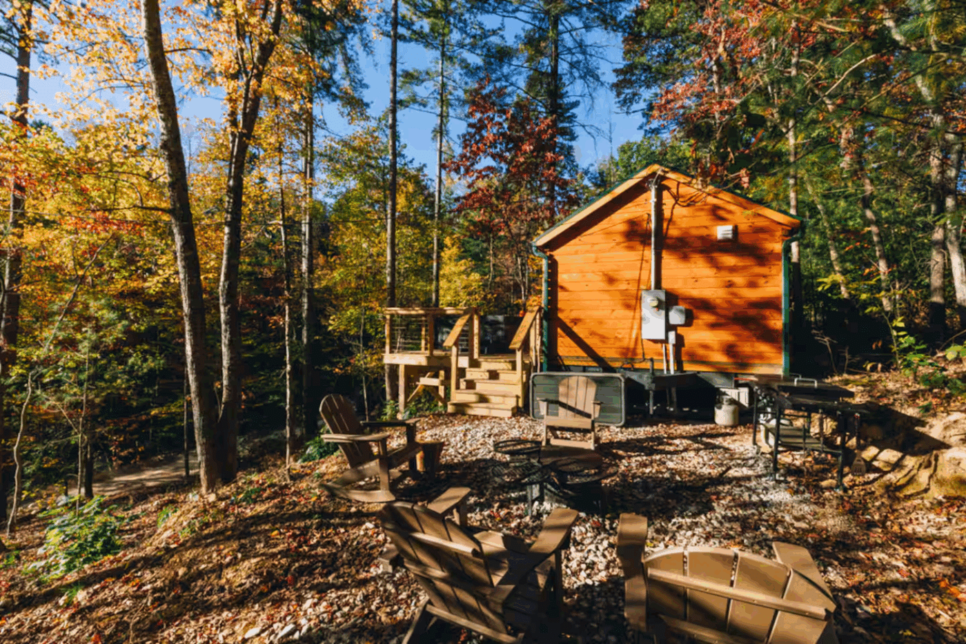 Pinecrest Park model tiny home in with porch in the woods in Campton Kentucky designed and built by Psy Homes