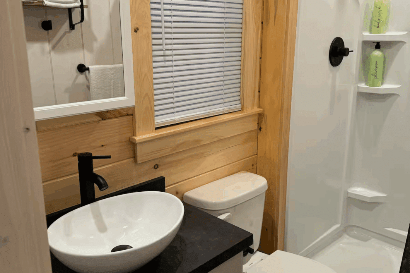 Fullsized bathroom in Pinecrest park model tiny home built and designed by Psy Homes
