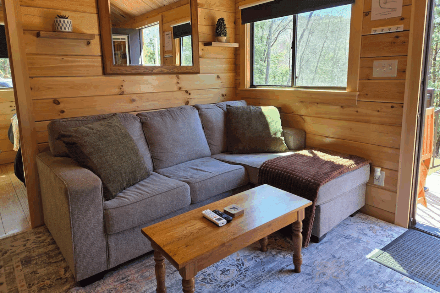Living Room Area of Pinecrest park model tiny hom park model in Bath NH built and design by ZOok Cabins