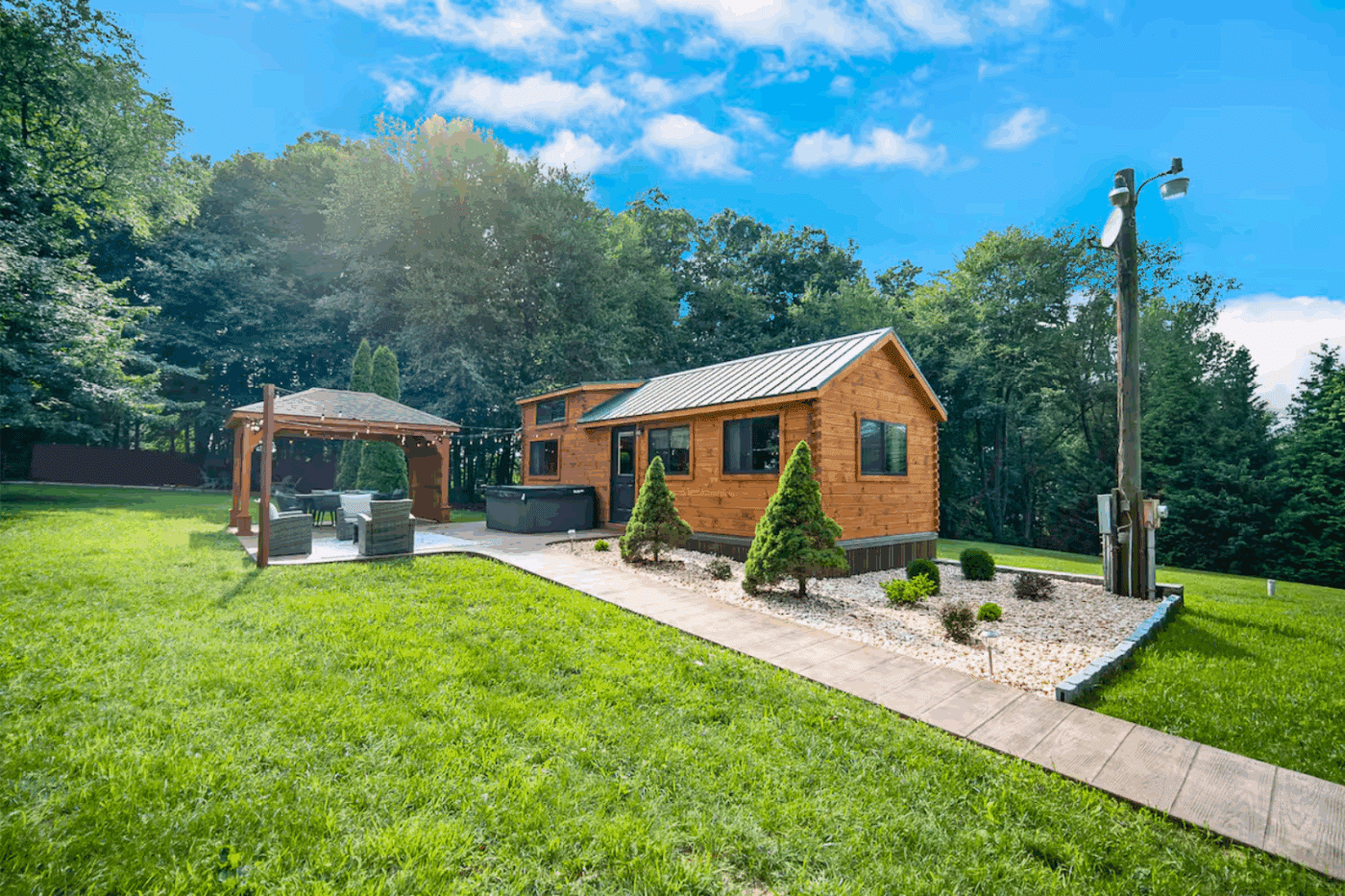 Outdoor hospitality area with Psy Homes park model tiny home in Strasburg Pa