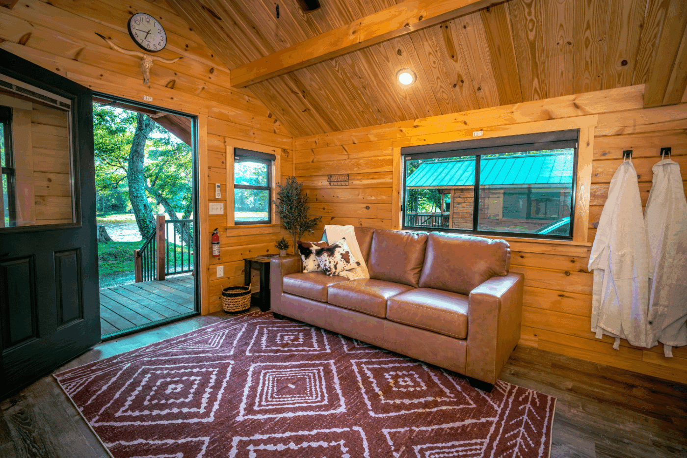 Log Studio park model tiny home at The outpost resort in Pond Eddy New York built and designed by Psy Homes