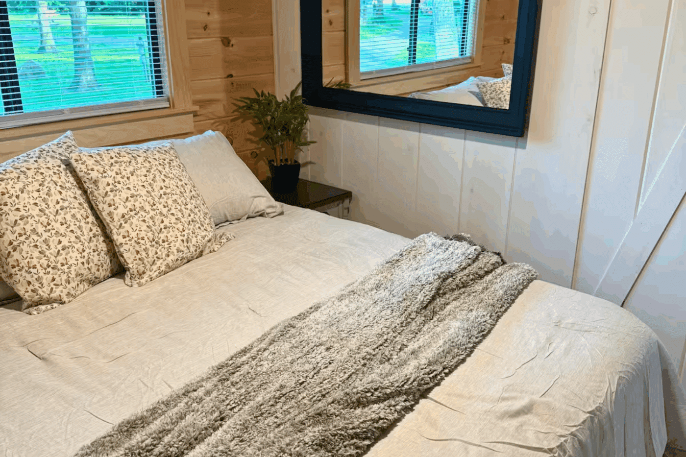 Pinecrest park model tiny home primary bedroom site 65 at Red Run Resort