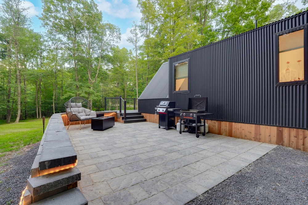 outdoor entertainment and hospitality area of hunting pa A frame tiny home