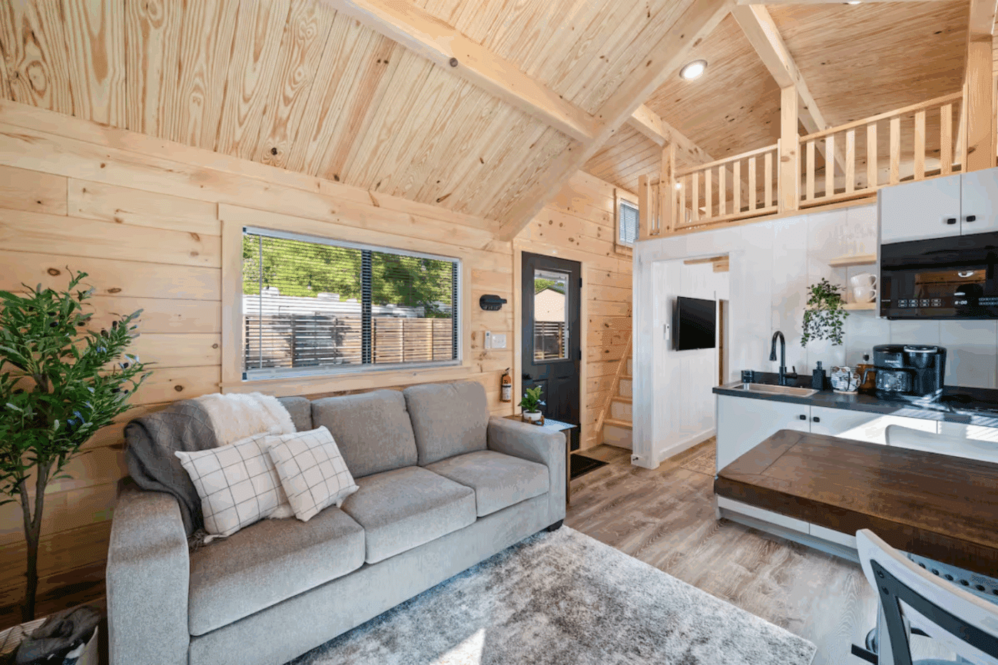 Livingroom and kitchen of pinecrest park model in branson missouri built and designed by Psy Homes