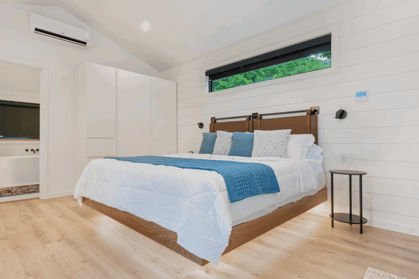 Bedroom A frame Studio park model tiny home Rushing Water 2 in Pond Eddy New York at at The Outpost Resort