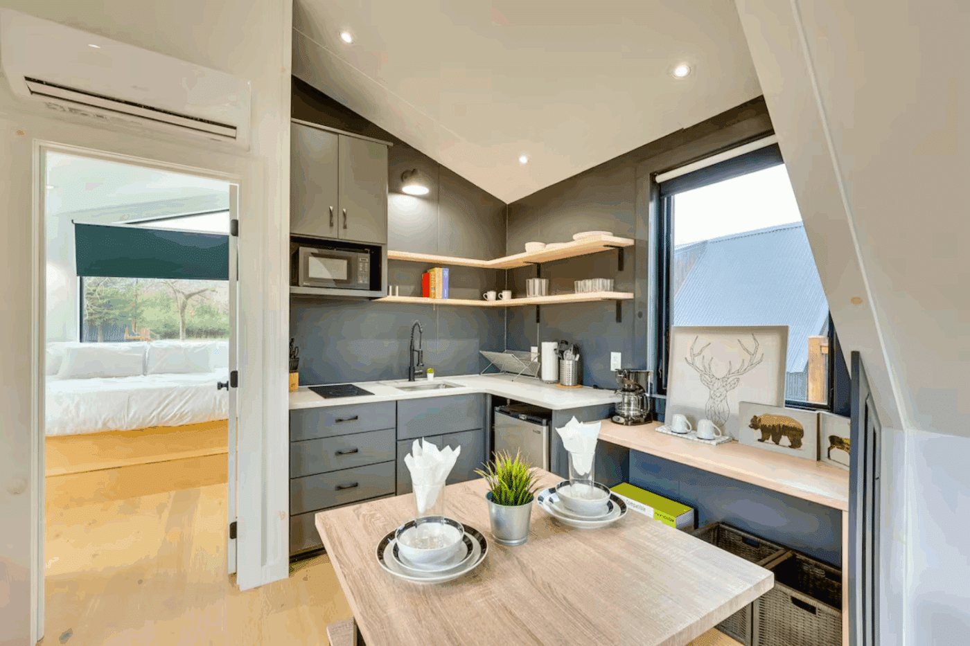 kitchen and dining room of A frame park model tiny home in Broken Bow OK