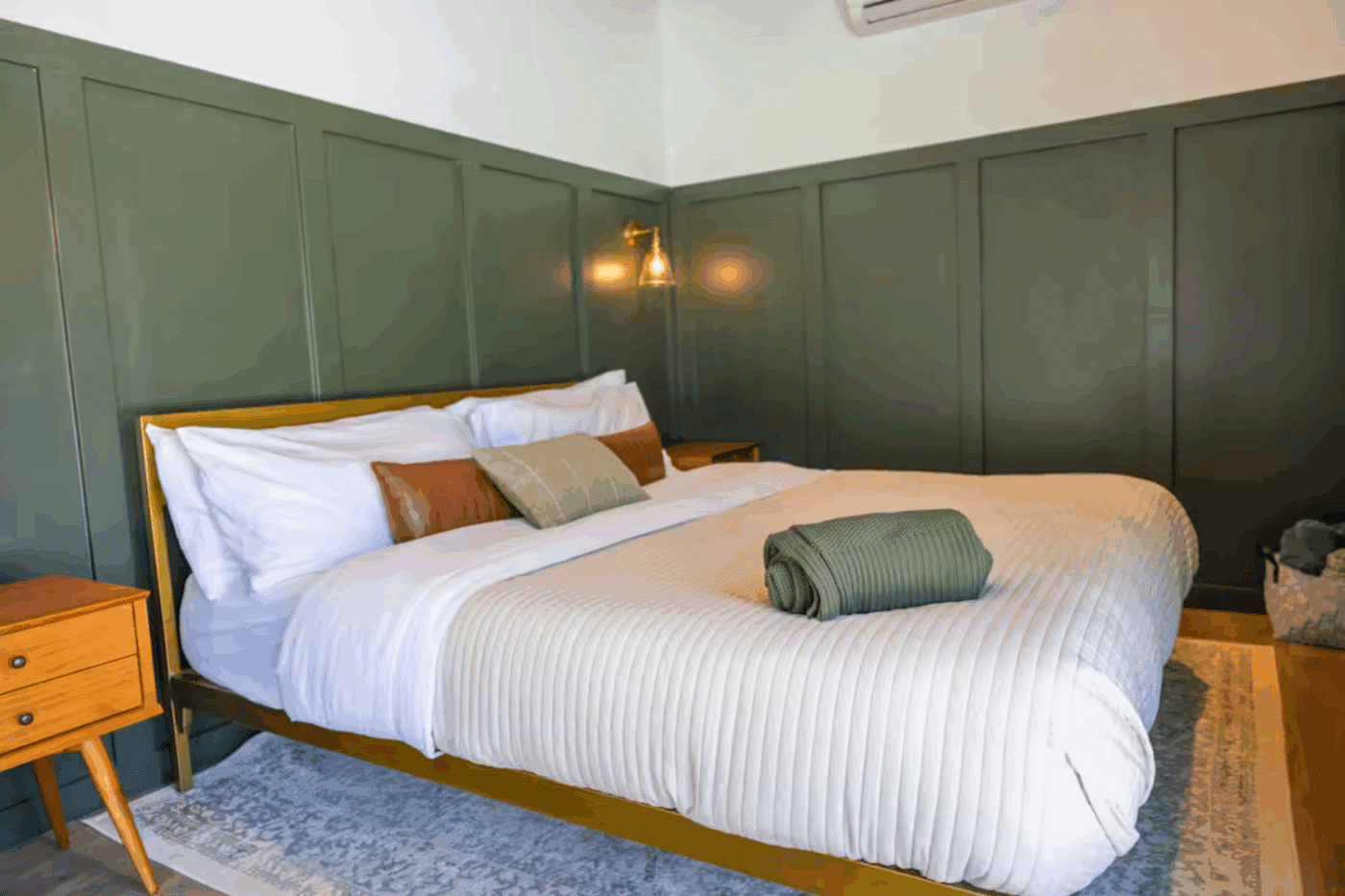 Custom bedroom of Alpine 2 park model tiny home built and designed by Psy Homes