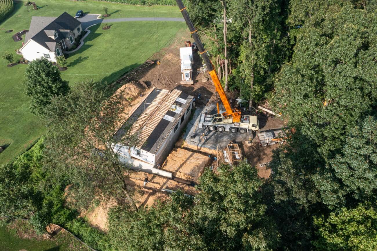 modern modular homes being set on foundation
