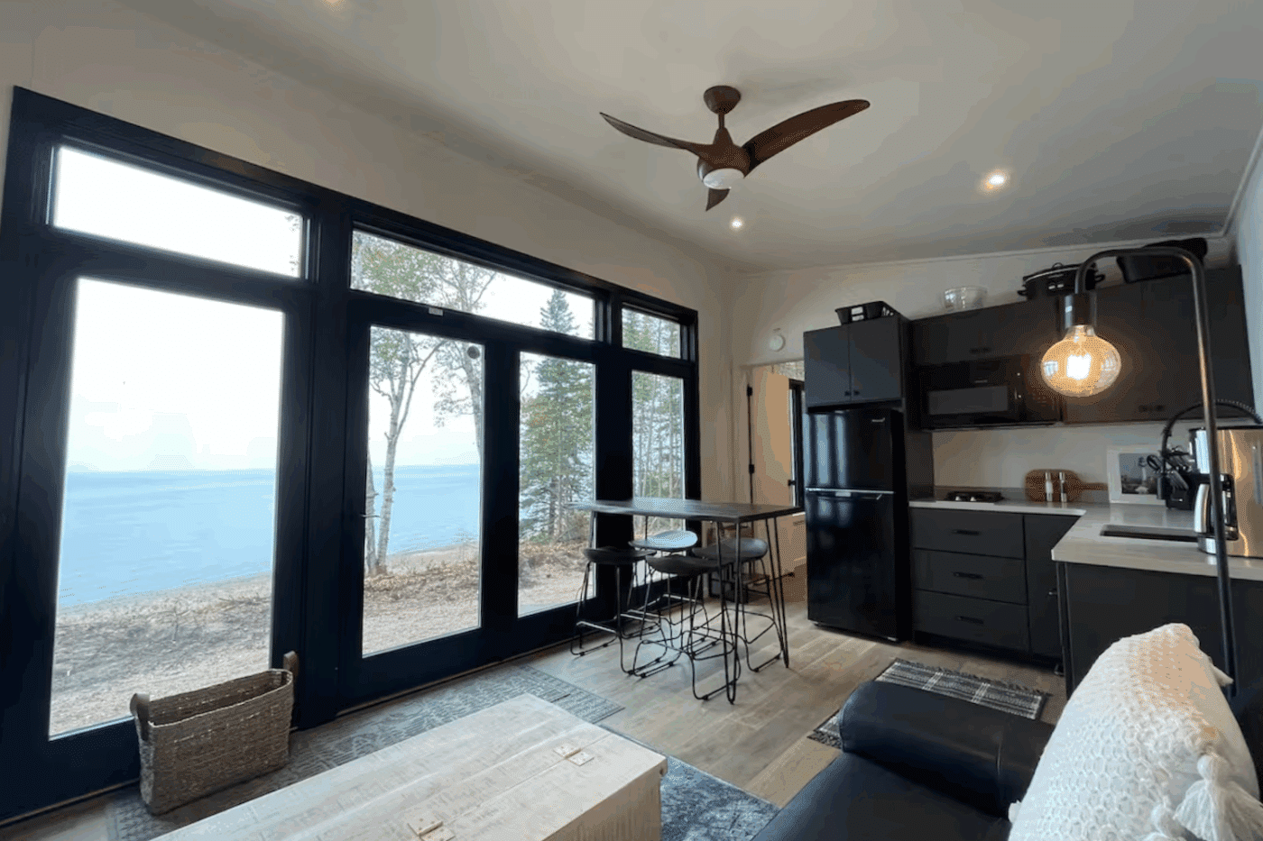 Window wall of Alpine Park model tiny home in Newberry Michigan