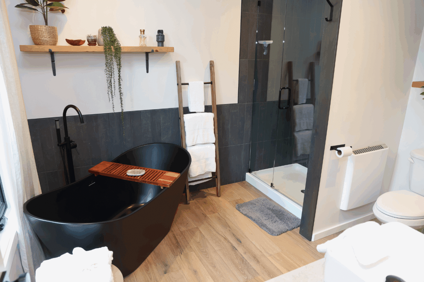 luxury bathroom with soaking tub and walk in shower in Alpine park model tiny home