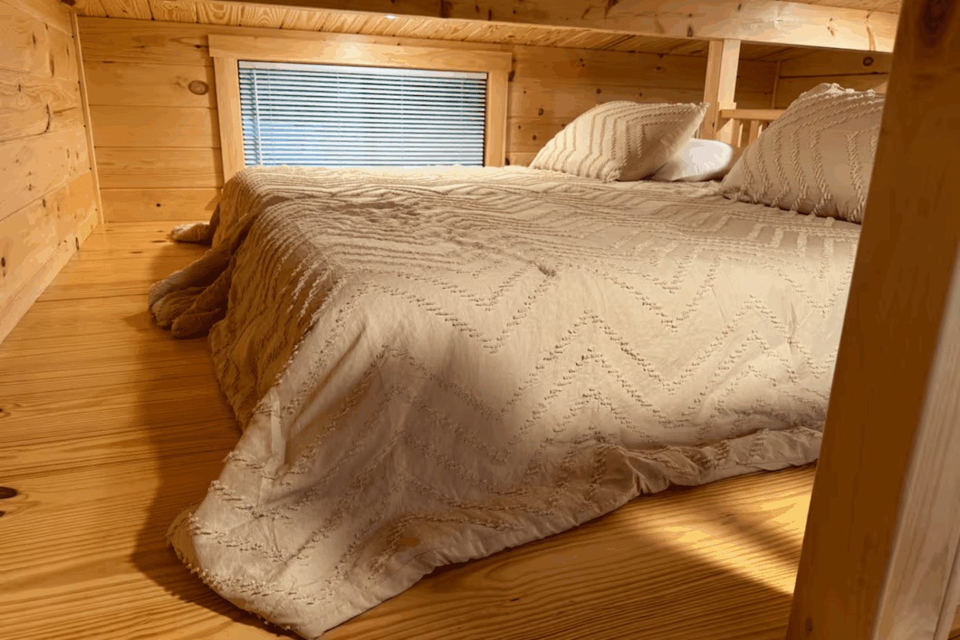 Lofted sleeping area of Pinecrest park model tiny home
