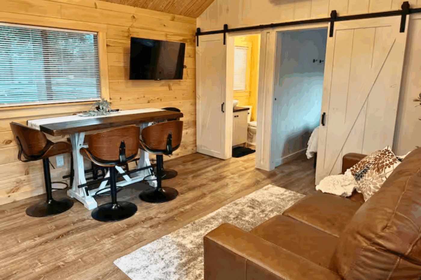 Dining Area of Pinecrest park model tiny home At Red Run Resort site 65 built and designed by Psy Homes