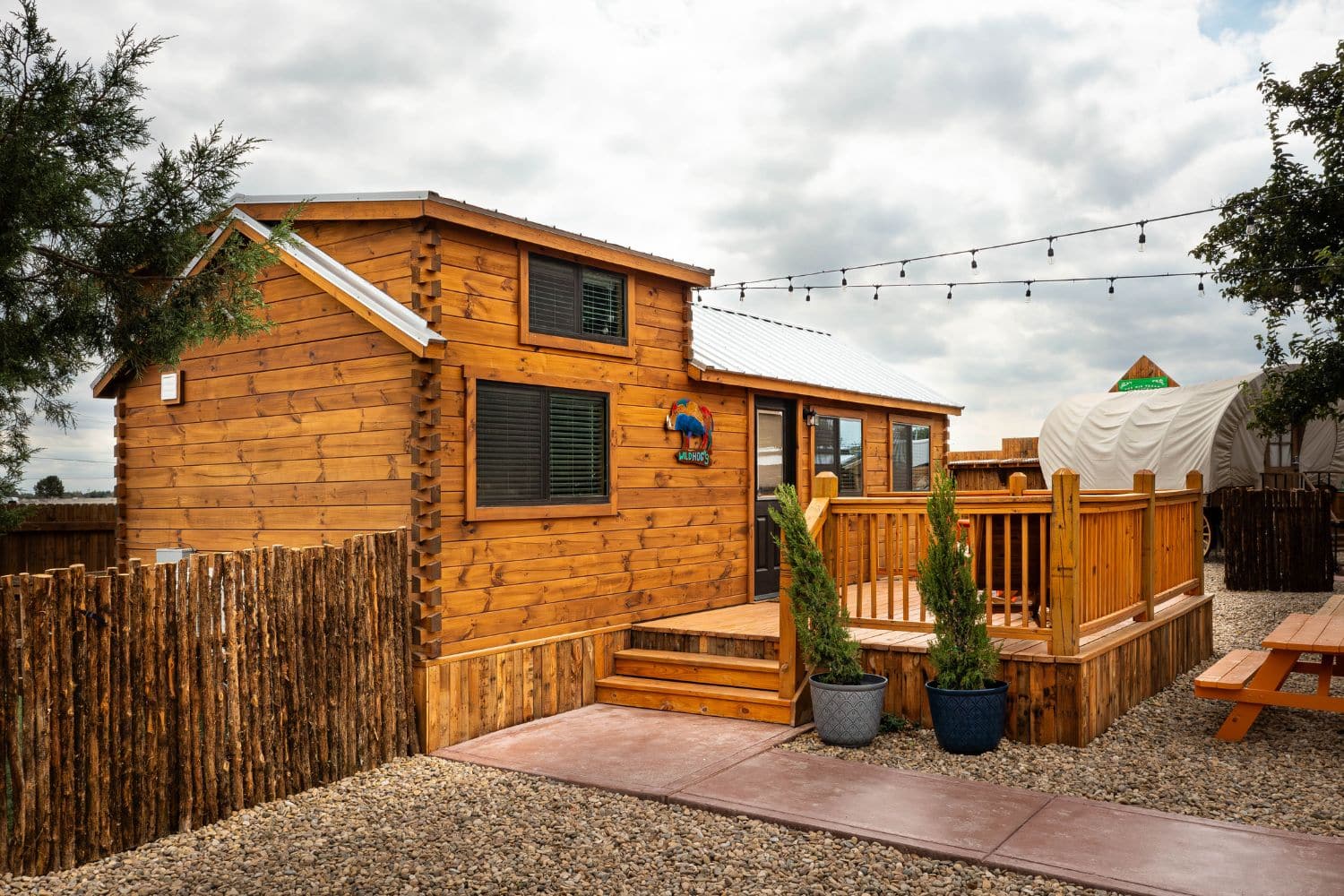 Tiny home community: One park model tiny home, deck, and yard