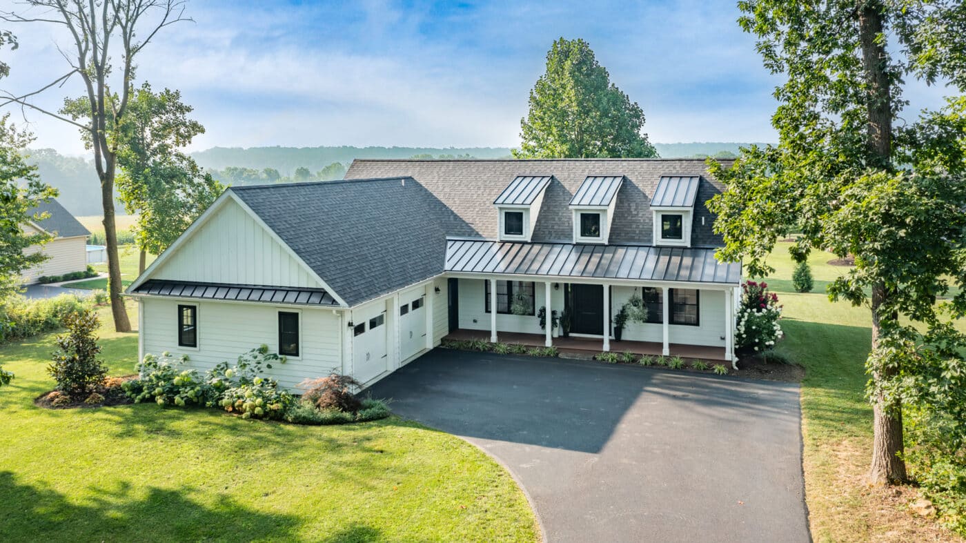 homestead modern farmhouse front view with garage added on