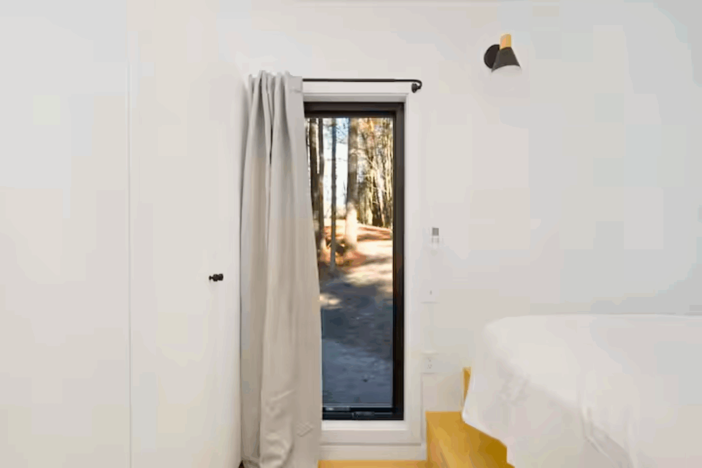 Bedroom in A Frame park model tiny home in Wiscasset Maine