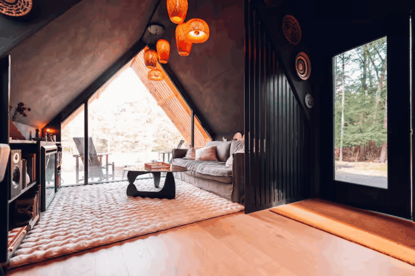 A Frame Park Model Tiny Home in Saugerties NY with customer designed cozy living room with mood lighting