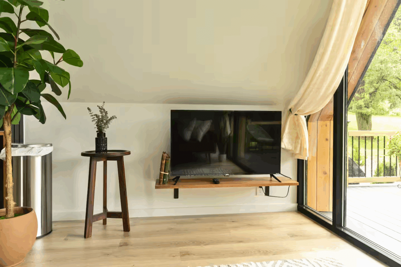living room of a frame park model tiny home in gaines pa