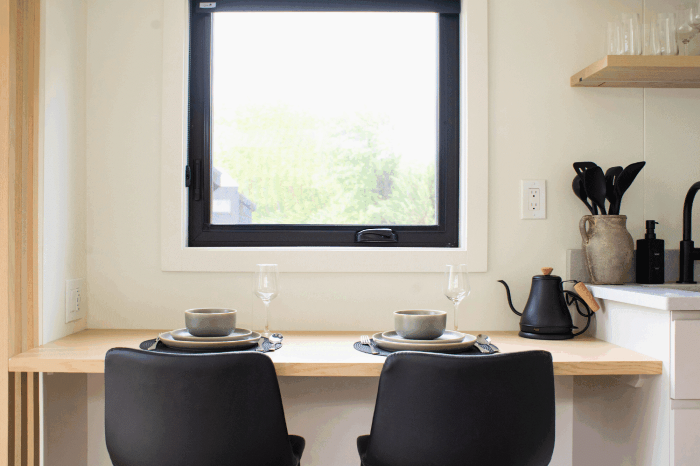 Dining area of A frame studio park model tiny home site 141 at Red Run Resort in New Holland Pa