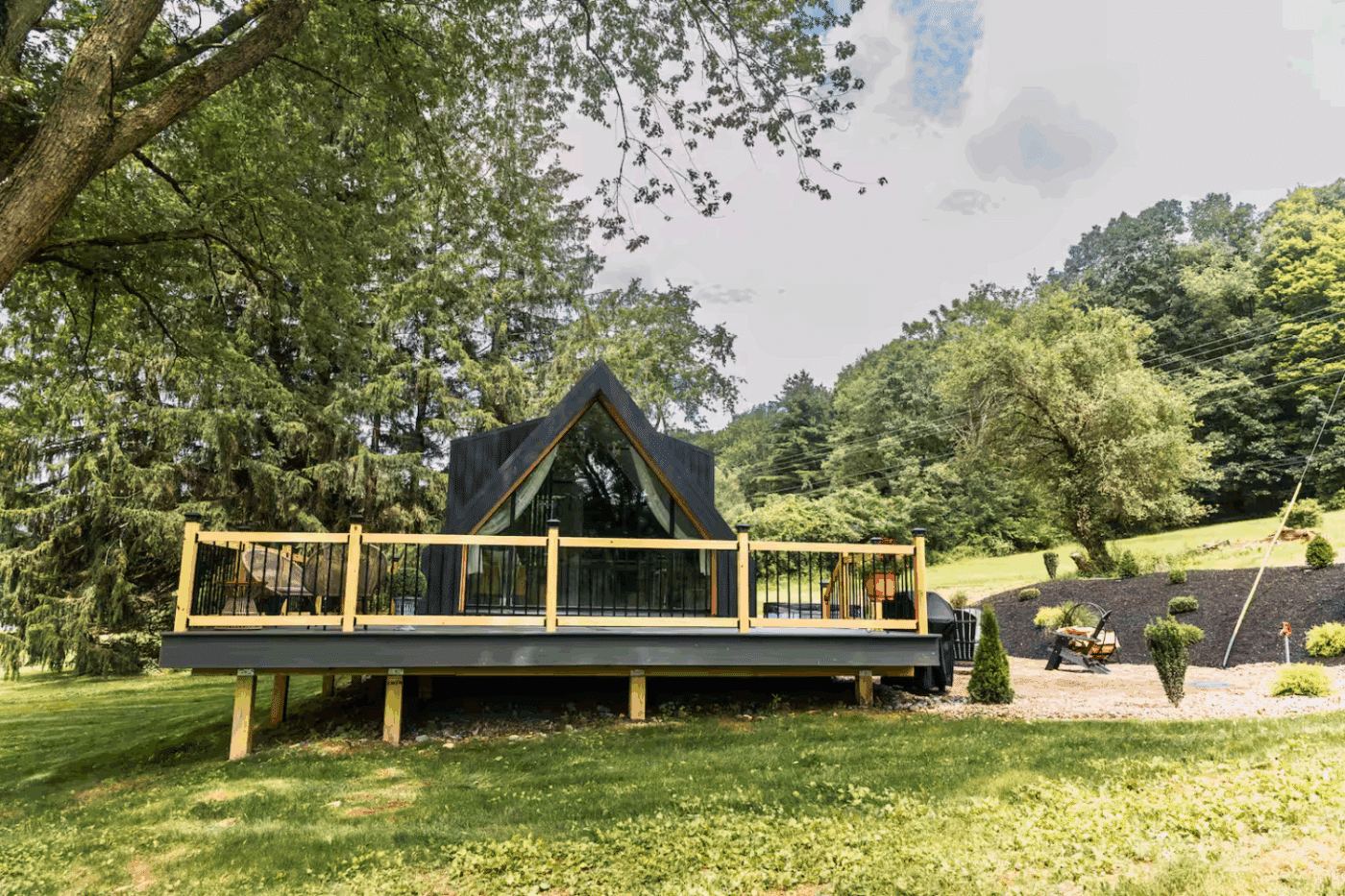 Gaines Pa A frame park model tiny home with wrap around porch designed and built by Psy Homes