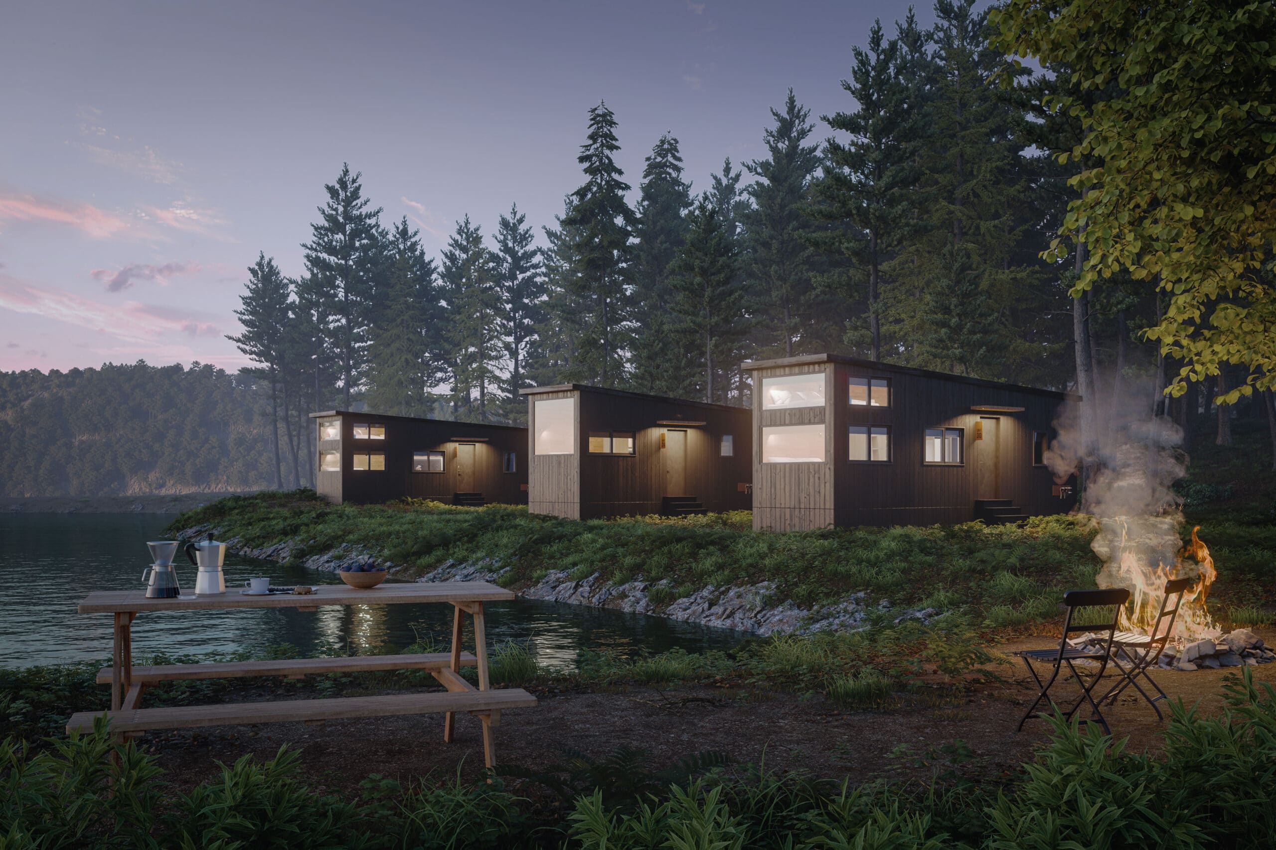 Charming lakeside tiny home community at dusk, with several modern tiny homes nestled among pine trees, featuring a campfire, outdoor seating, and a picnic table in the foreground