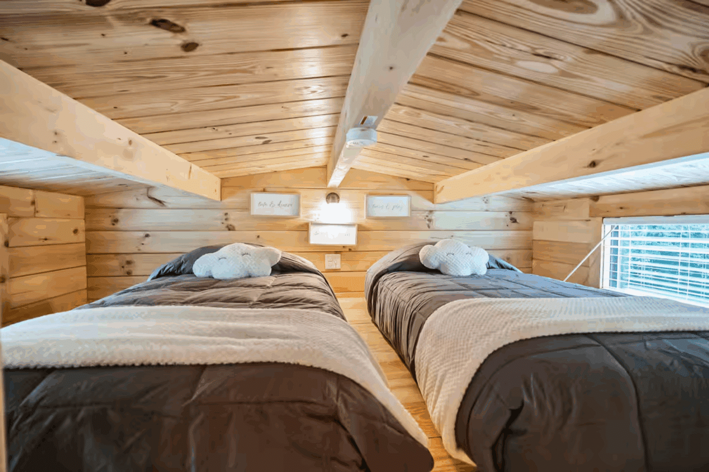 Lofted sleeping area in Pinecrest park model tiny home built and designed by Psy Homes located in Strasburg Pa