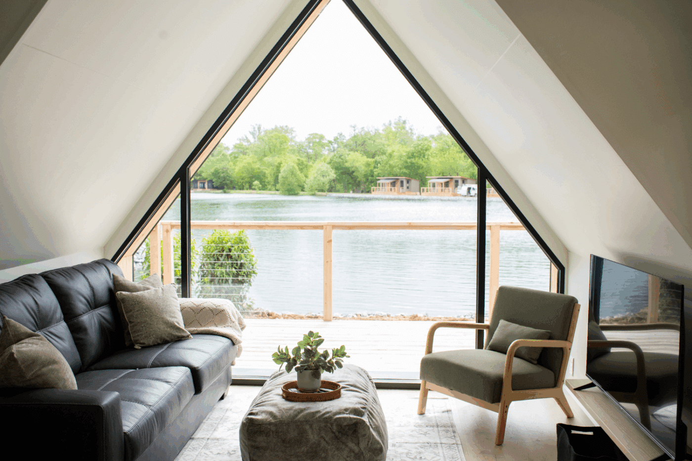 Living Room of A frame studio Park model tiny home built and designed by Zook cabins locate at site 140 at Red Run Resort in New Holland Pa