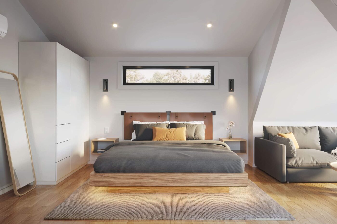 Modern A-frame style studio park model bedroom with wood platform bed, gray bedding, and minimalist décor.