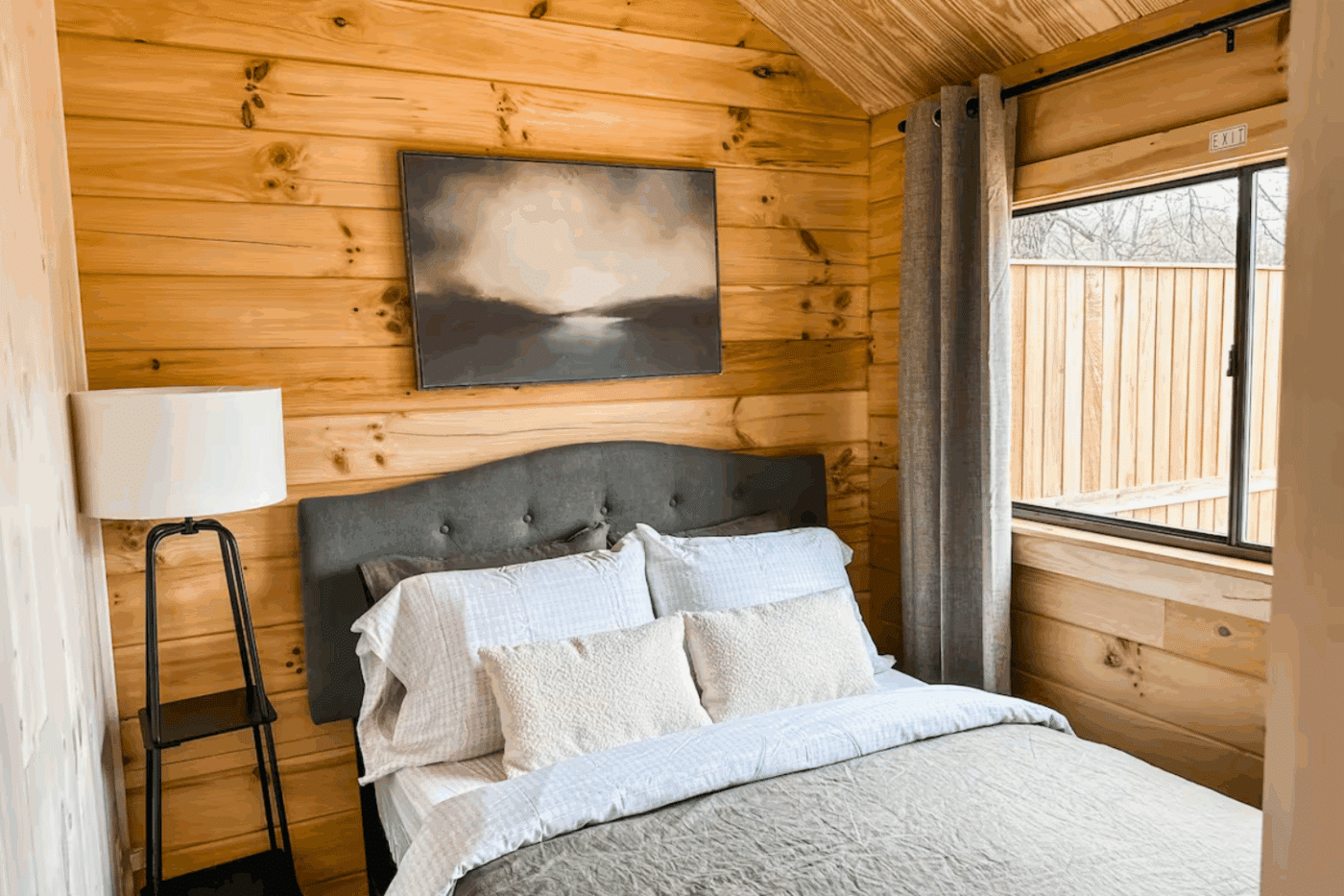 Second bedroom with full sized bed in Psy Homes park model Pinecrest model in Harrison Arkansas