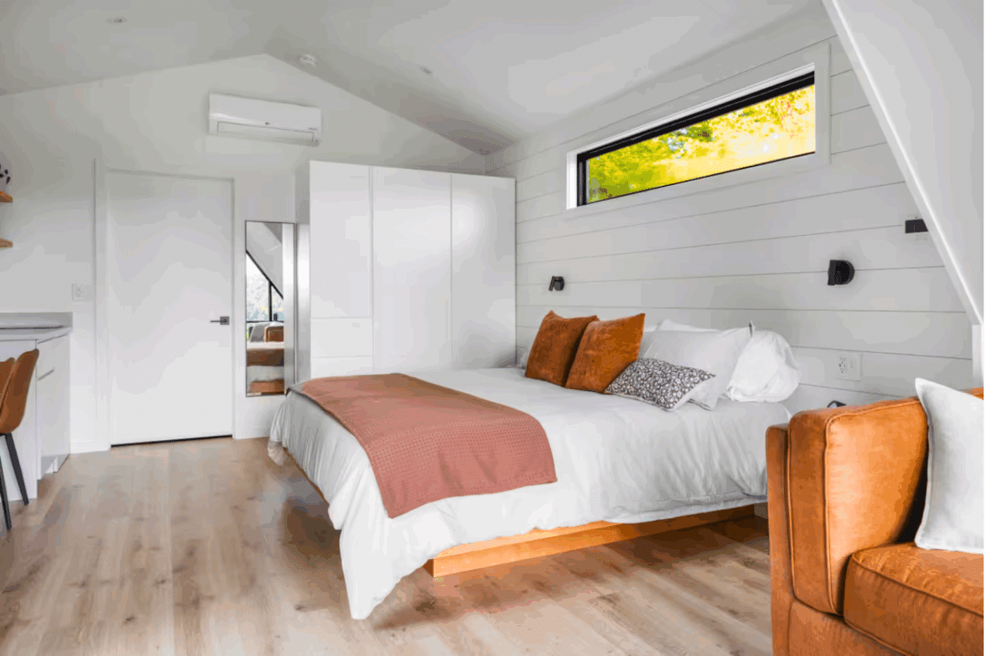 Sleeping area and closet of A frame studio park model tiny home in Shippenville Pa