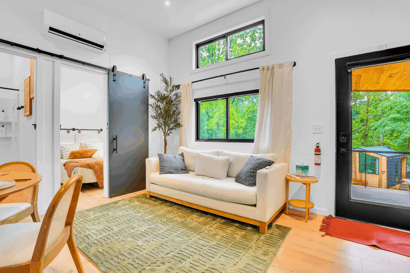living room of cascade park model tiny home built by zook cabins in alexandria pa at site 14
