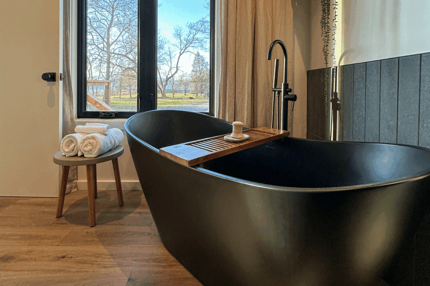 free standing soaking tub in Alpine park model tiny home built and designed by Psy Homes