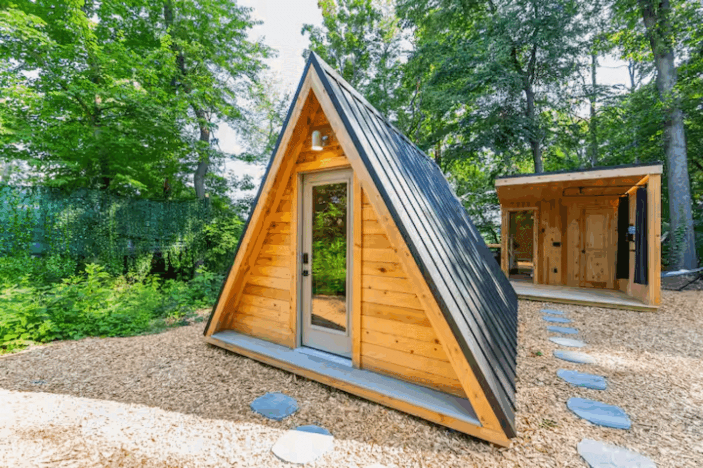 A frame glamping pod Vista Christiana Pa with outdoor hospitality area