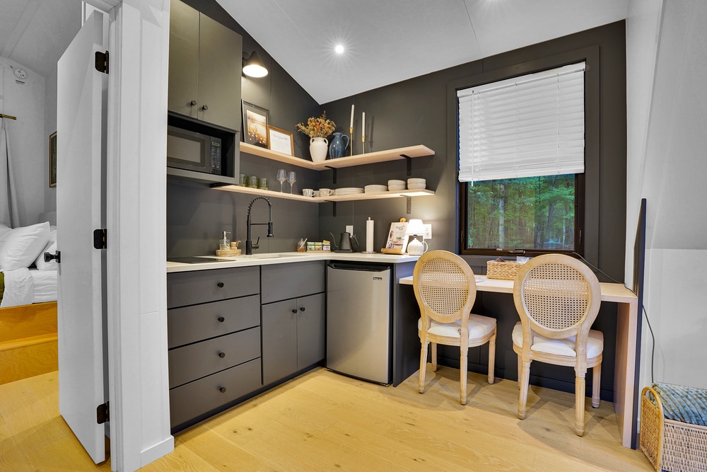 kitchen and dining area of a frame park model tiny home in Huntingdon Pa