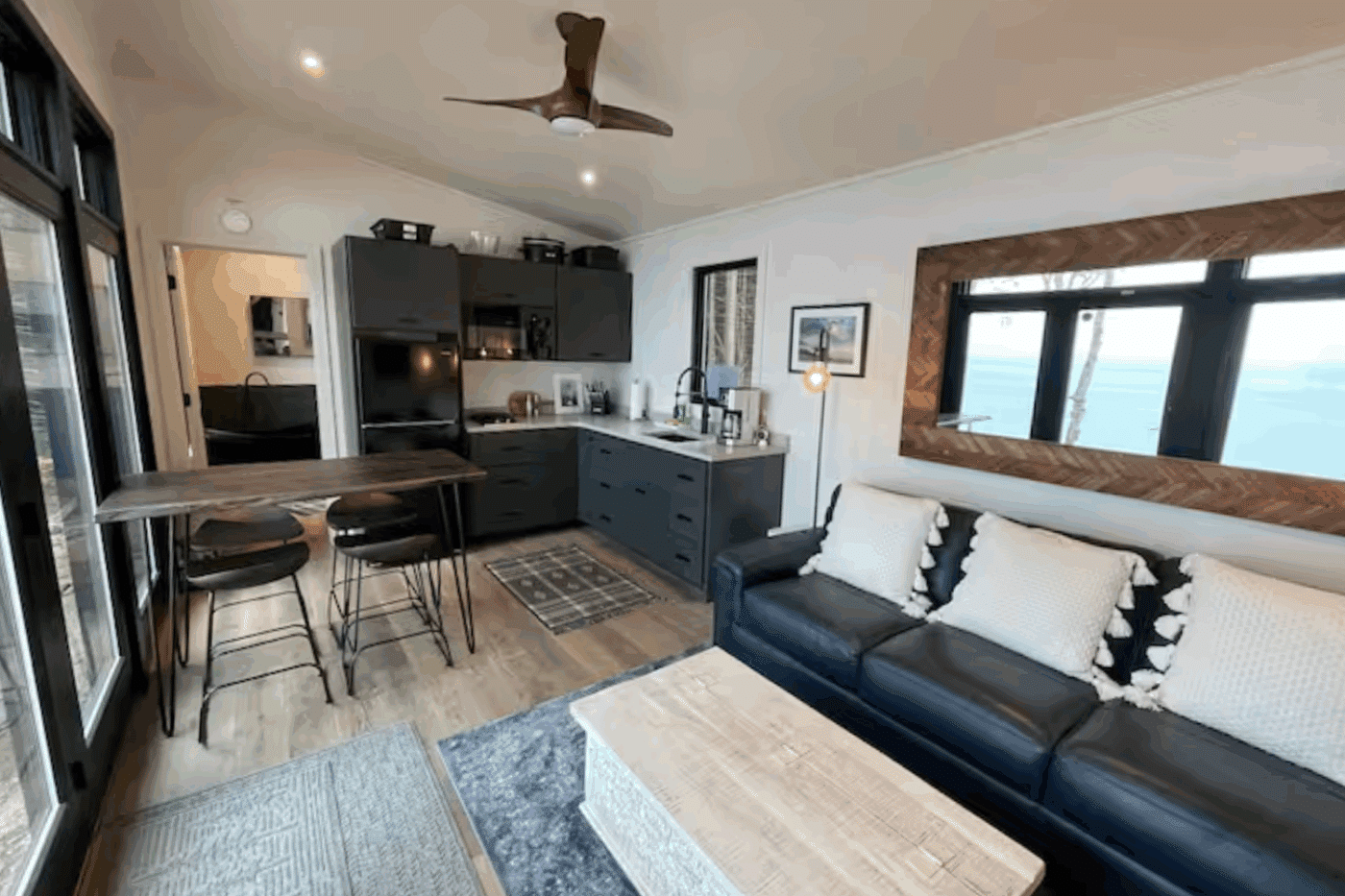 Alpine Park Model tiny home with full sized kitchen dining and living room area in Newberry Michigan