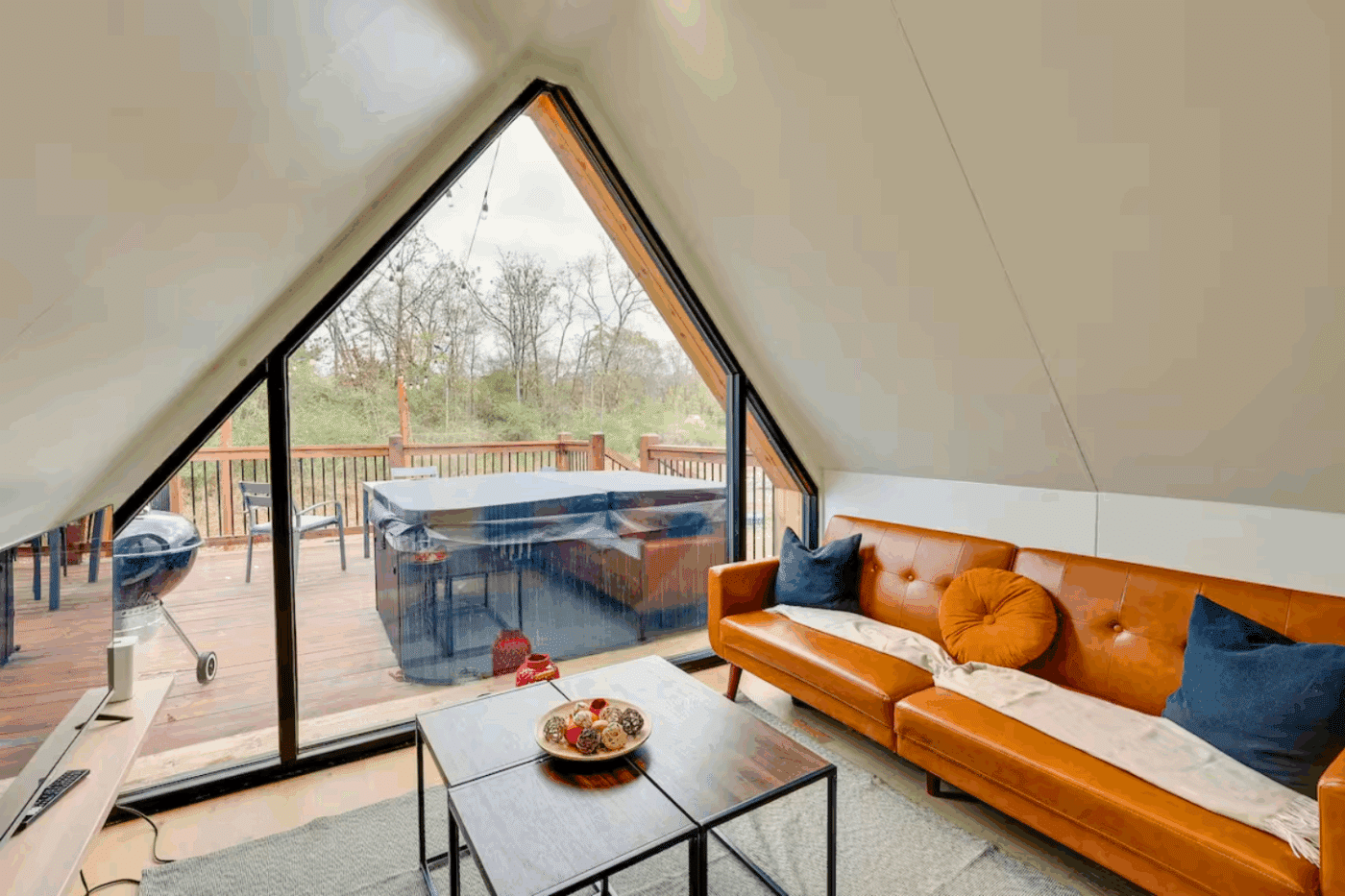 living room of A frame park model tiny home in Broken Bow OK