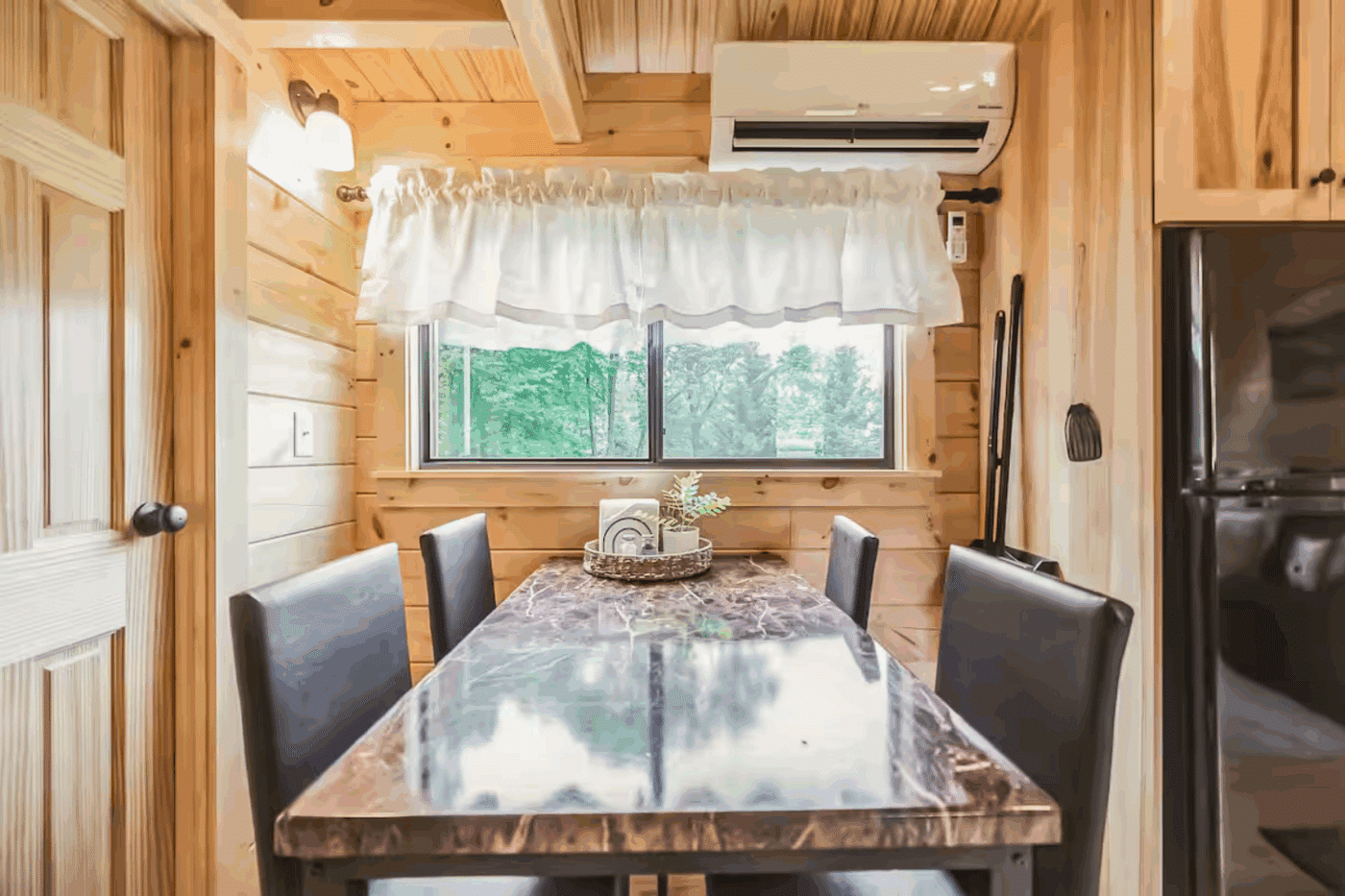 Dining area of Pinecrest park model tiny home designed and built by Psy Homes located in Strasburg Pa