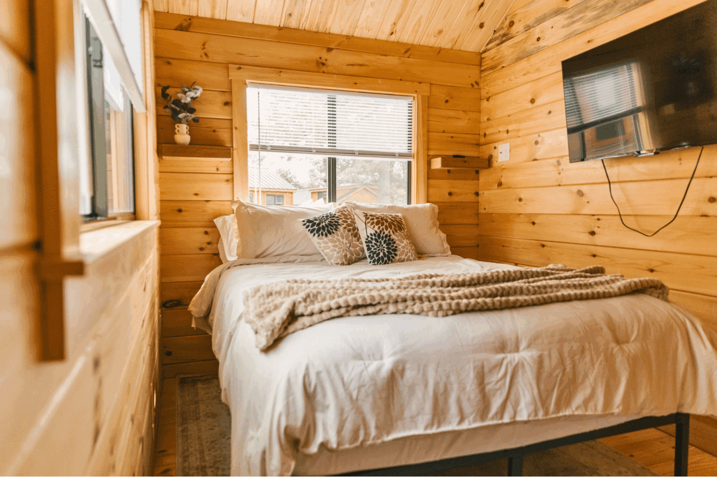 Main bedroom of pinecrest park model tiny home built and designed By Psy Homes