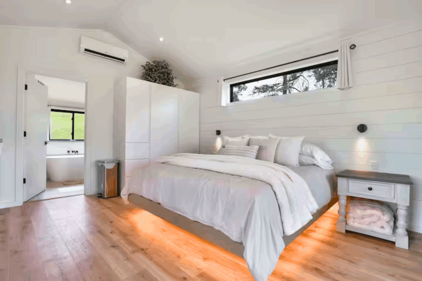 sleeping area with closet of A frame studio park model in Augusta West Virginia