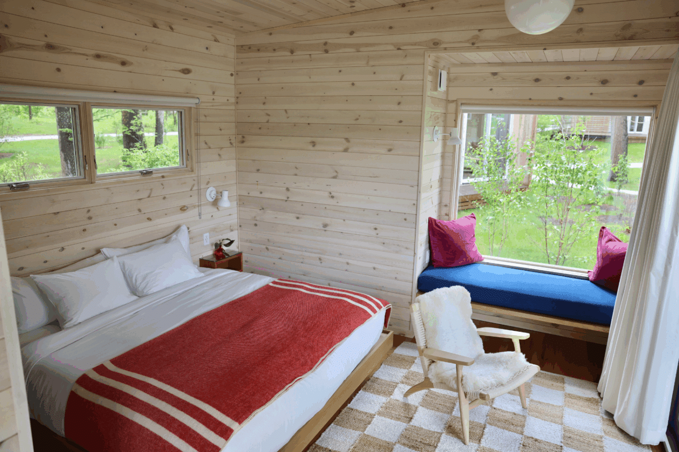 Custom bedroom and living room in tiny home park model at hotel Propsect berskhires