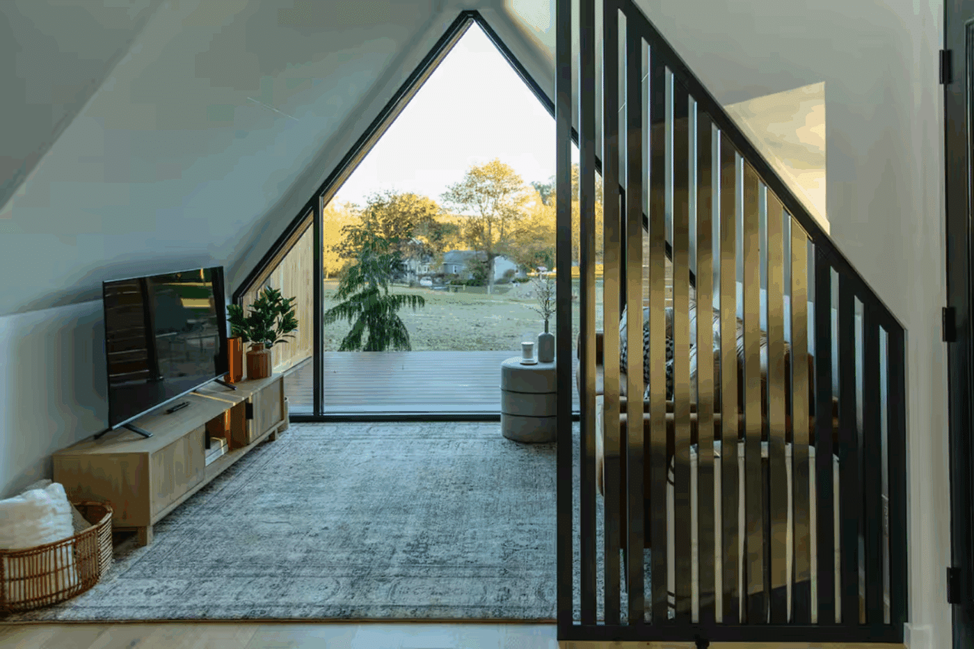 Cozy A Frame Living room in a tiny home built by Psy Homes